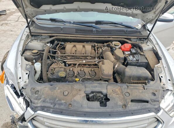 1FAHP2E85JG134252 2018 FORD TAURUS Серебряный Вид задней части салона
