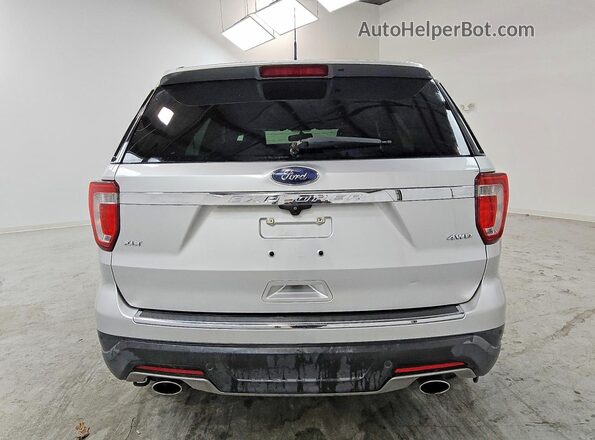1FM5K8D84JGC15559 2018 FORD EXPLORER Серебряный Вид сзади