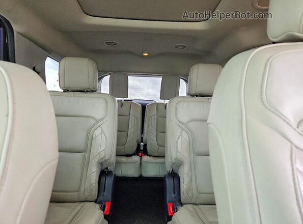 1FM5K8HT8GGC16415 2016 FORD EXPLORER White Rear seats view