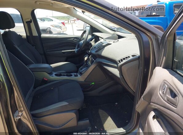 1FMCU0F71GUB46945 2016 FORD ESCAPE Gray Вид салону спереду