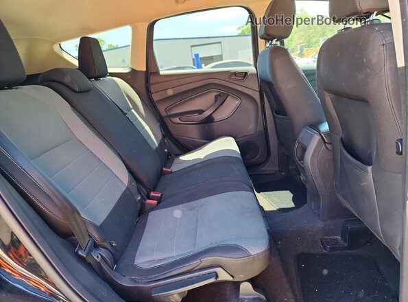 1FMCU0F76HUB90750 2017 FORD ESCAPE Black Widok wnętrza z tyłu