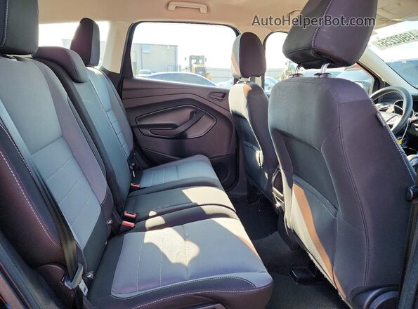 1FMCU0F79HUC08223 2017 FORD ESCAPE Черный Вид задней части салона