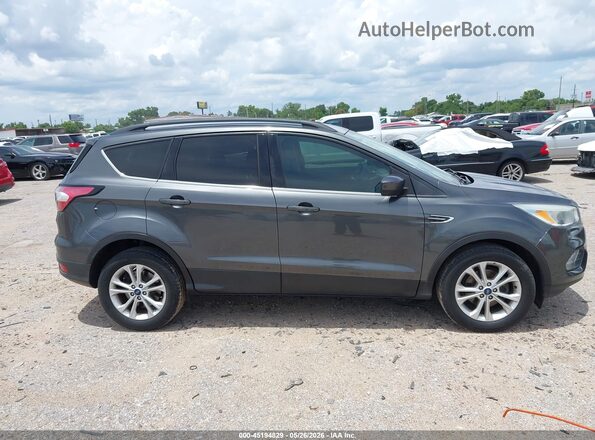 1FMCU0GD0JUA61087 2018 FORD ESCAPE Серый Вид задней части салона