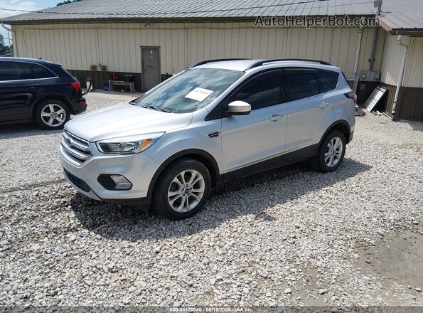 1FMCU0GD0JUC68532 2018 FORD ESCAPE Silver წინა მარცხენა ხედი სამი მეოთხედიდან