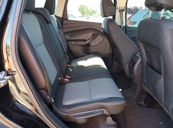1FMCU0GD2HUC73354 2017 FORD ESCAPE Черный Вид задней части салона