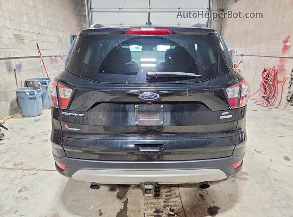 1FMCU0GD3JUD37245 2018 FORD ESCAPE Black Rear view