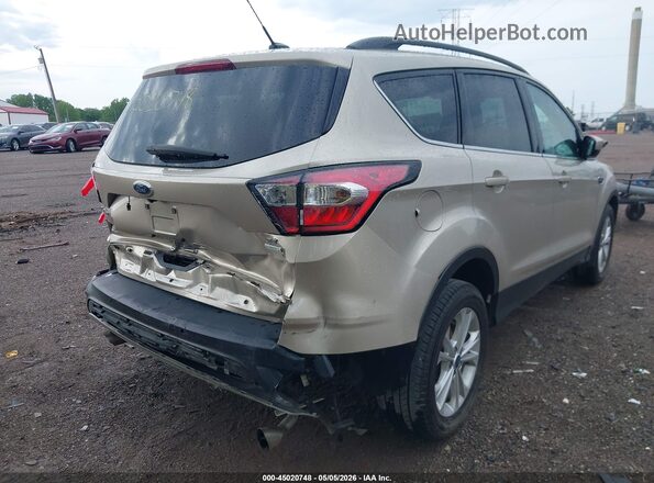 1FMCU0GD4HUD83595 2017 FORD ESCAPE Золотой Вид спереди
