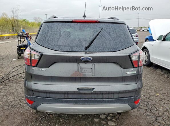 1FMCU0GD6JUC90664 2018 FORD ESCAPE Серый Вид сзади
