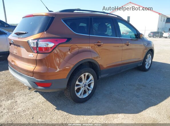 1FMCU0GD9HUD54707 2017 FORD ESCAPE Оранжевый Задняя правая четверть