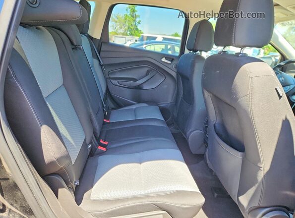 1FMCU0GDXHUB77908 2017 FORD ESCAPE Black Widok wnętrza z tyłu