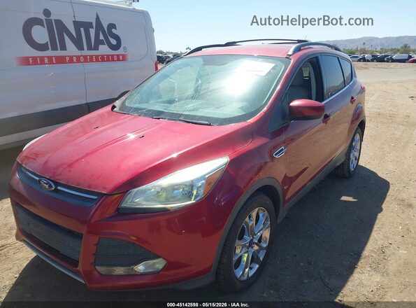 1FMCU0GX3GUB17025 2016 FORD ESCAPE Maroon Vista tres cuartos delantera izquierda