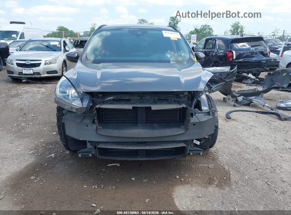 1FMCU0H64LUC03556 2020 FORD ESCAPE Gray Vista interior trasera