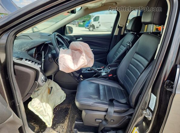 1FMCU0J91GUB54598 2016 FORD ESCAPE Серый Вид салона спереди