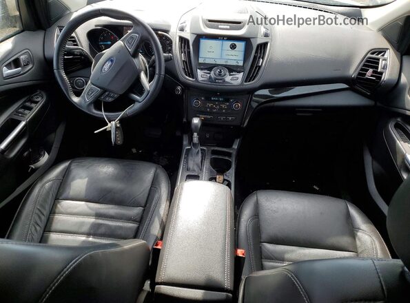 1FMCU0J92HUE02889 2017 FORD ESCAPE Золотой Вид панели приборов