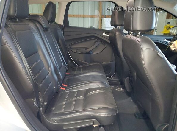 1FMCU0JDXHUD17755 2017 FORD ESCAPE Серебряный Вид задней части салона