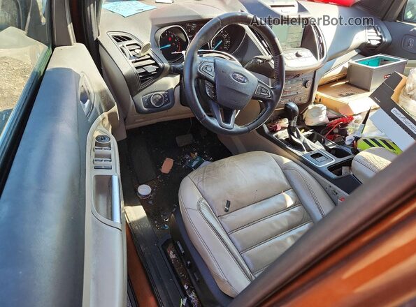 1FMCU9G91HUC06129 2017 FORD ESCAPE Gold Dashboard view