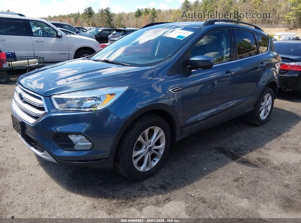 1FMCU9GD1JUB75779 2018 FORD ESCAPE Blue Front left