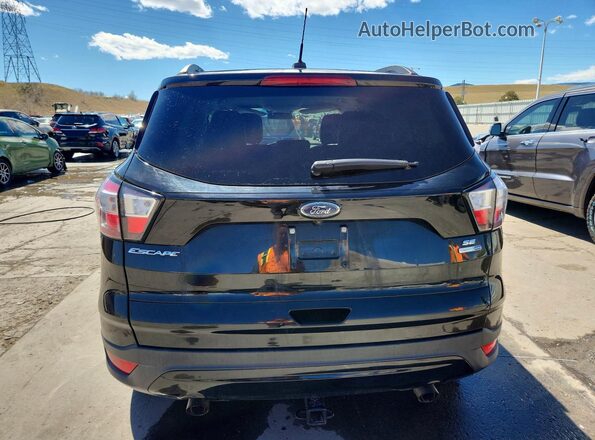 1FMCU9GD2JUC59707 2018 FORD ESCAPE Черный Вид сзади