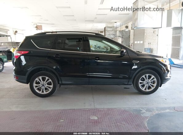 1FMCU9GD3JUD08655 2018 FORD ESCAPE Черный Вид задней части салона