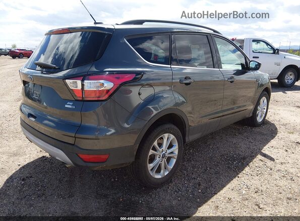 1FMCU9GD4JUD31054 2018 FORD ESCAPE Gray Trasero derecho