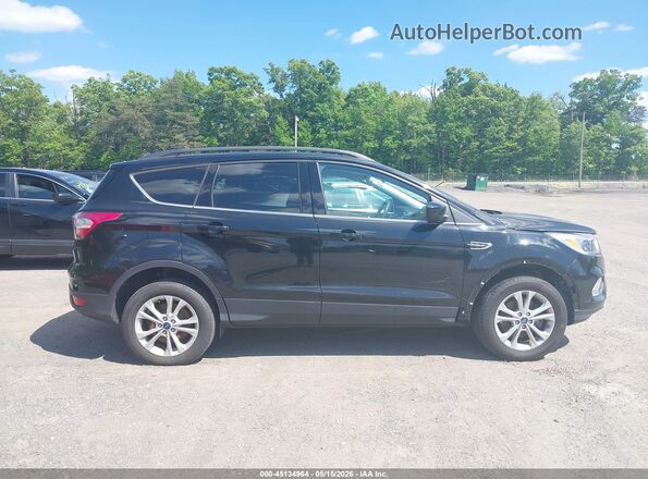 1FMCU9GD7JUC16335 2018 FORD ESCAPE Black Widok wnętrza z tyłu