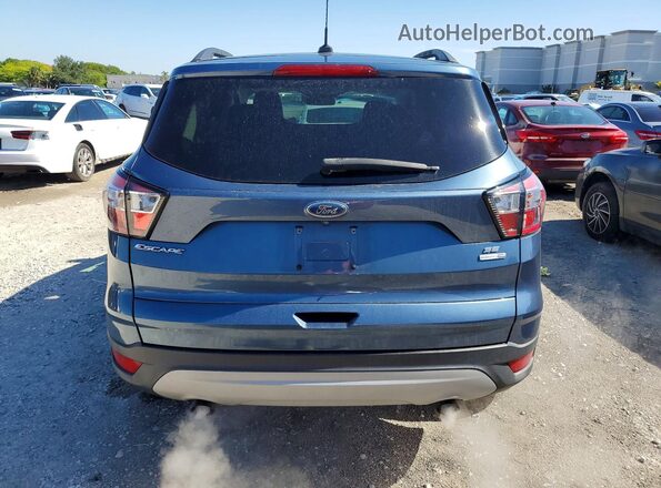 1FMCU9GD7JUC79127 2018 FORD ESCAPE Синий Вид сзади
