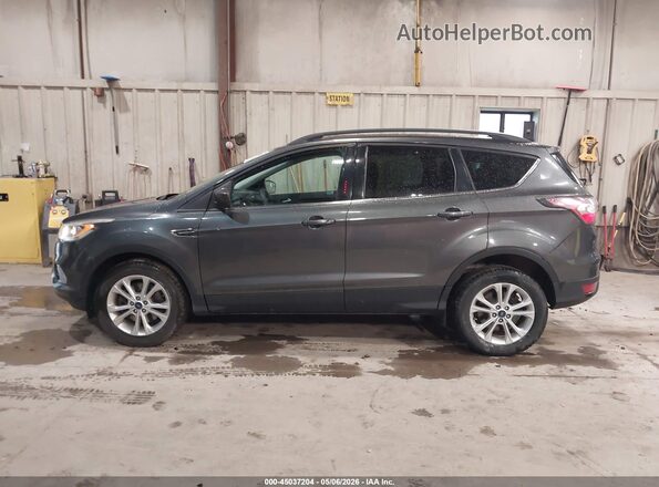 1FMCU9GD8HUB06971 2017 FORD ESCAPE Gray Widok wnętrza z tyłu