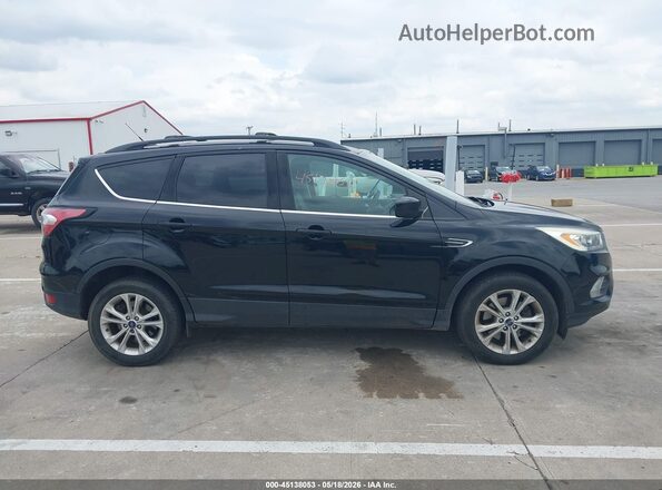 1FMCU9GD8HUD95365 2017 FORD ESCAPE Black Widok wnętrza z tyłu