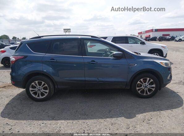1FMCU9GD8JUB20245 2018 FORD ESCAPE Синий Вид задней части салона