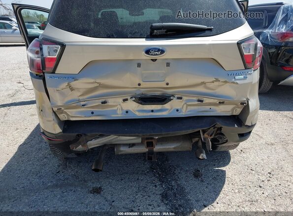 1FMCU9J94HUD89325 2017 FORD ESCAPE Золотой Вид спереди