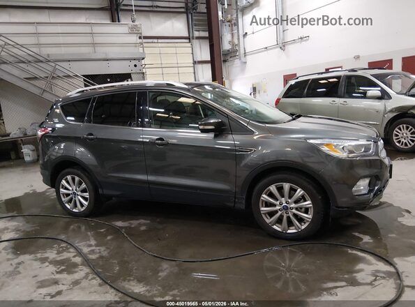 1FMCU9J98HUD41682 2017 FORD ESCAPE Black Widok wnętrza z tyłu