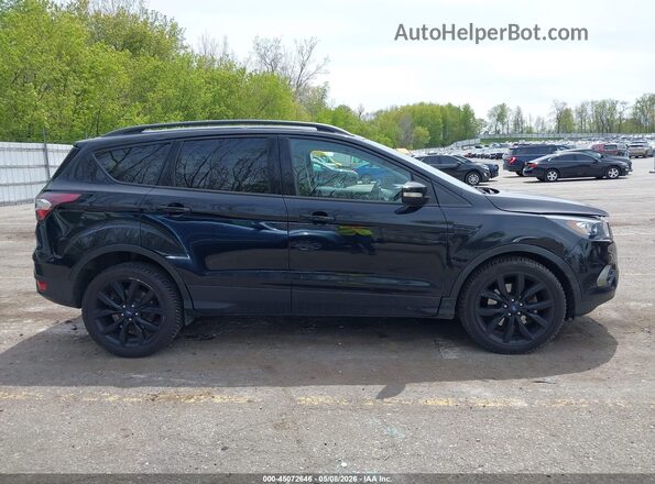 1FMCU9JD2HUE96488 2017 FORD ESCAPE Black Widok wnętrza z tyłu