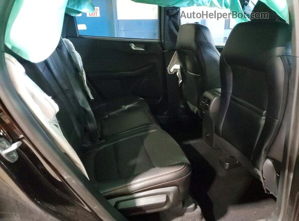 1FMCU9MN0RUA95284 2024 FORD ESCAPE Черный Вид задней части салона