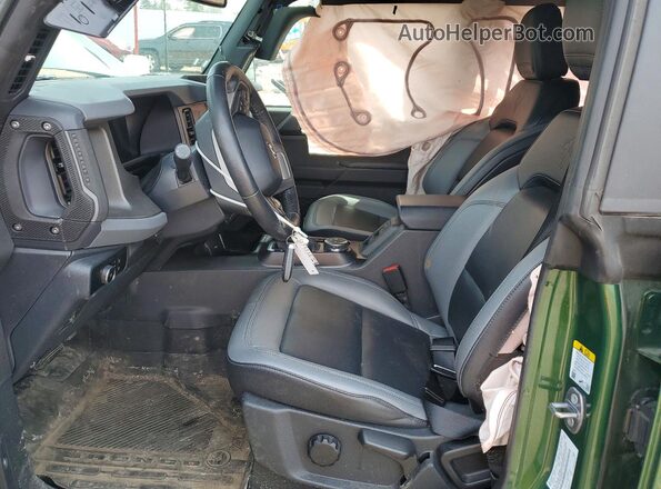 1FMDE7BH6RLA24082 2024 FORD BRONCO Зеленый Вид салона спереди