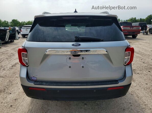 1FMSK7DH4RGA38018 2024 FORD EXPLORER Серебряный Вид сзади