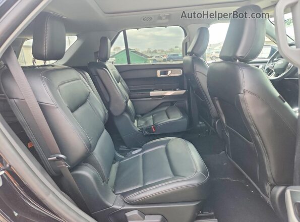 1FMSK8FH0NGA21679 2022 FORD FORD EXPLORER Черный Вид задней части салона