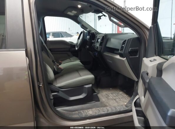 1FTEW1EB0LKF20891 2020 FORD F150 Коричневый Вид салона спереди
