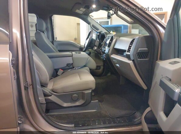 1FTEW1EBXKKD65569 2019 FORD F150 Brown Vista interior delantera