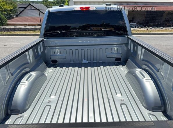1FTEX1CB2PKE51093 2023 FORD F150 Silver Rear interior view
