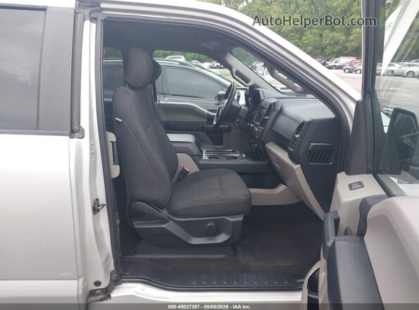 1FTEX1EP7KKE48224 2019 FORD F150 Серебряный Вид салона спереди