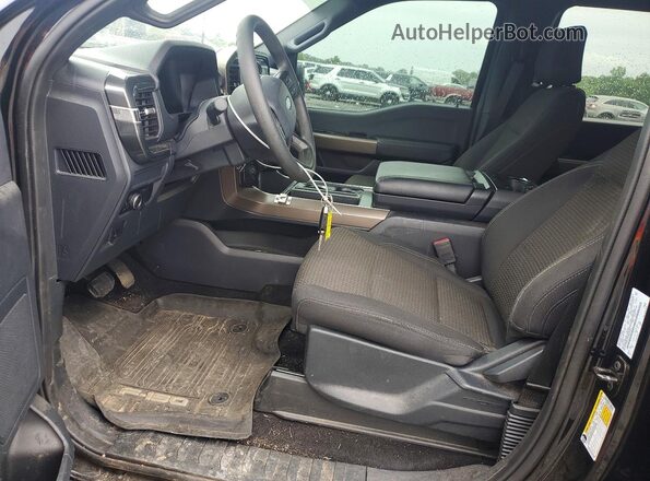 1FTFW2L54RFB63319 2024 FORD F150 Черный Вид салона спереди