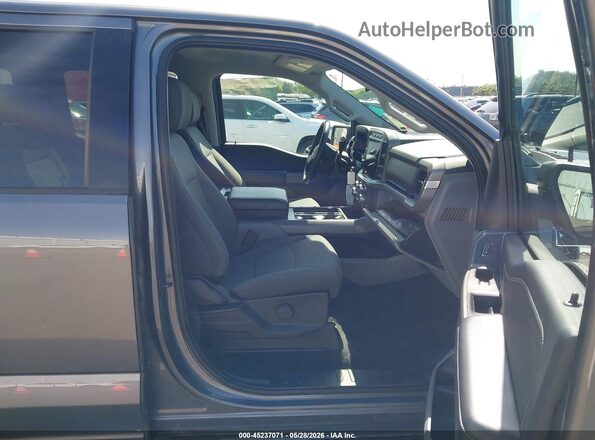 1FTFW3LD0RFA71878 2024 FORD F150 Серый Вид салона спереди