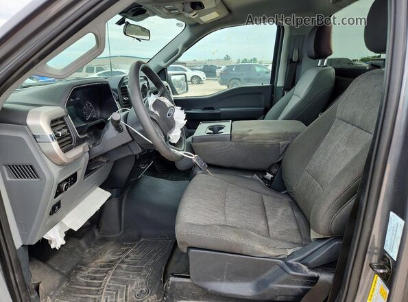 1FTMF1C59PKE73679 2023 FORD F150 Серый Вид салона спереди