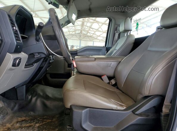 1FTNF1CF9GKE51243 2016 FORD F150 Silver Vista interior delantera