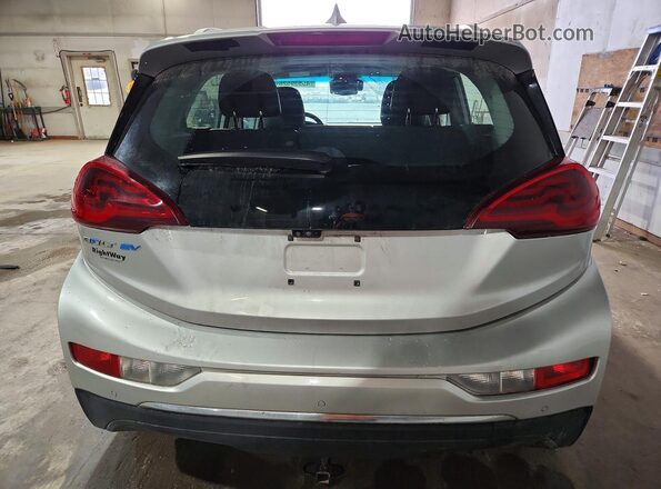 1G1FX6S0XJ4137469 2018 CHEVROLET BOLT Серебряный Вид сзади