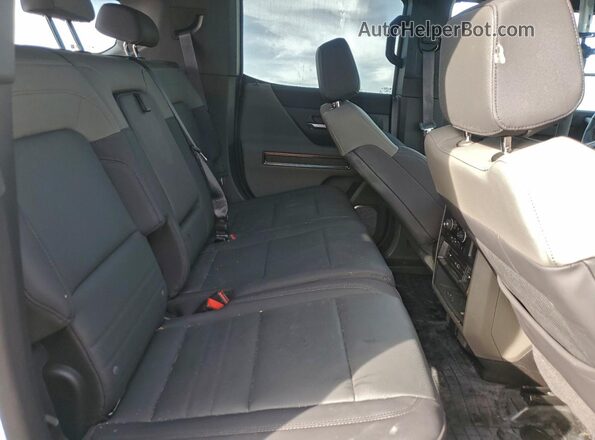1GKB0RDCXRU114261 2024 GMC HUMMER White Vista interior trasera