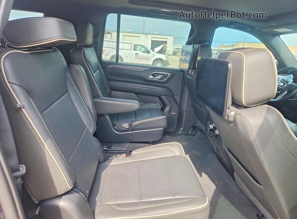 1GKS1GKD6PR137775 2023 GMC YUKON Charcoal Widok wnętrza z tyłu