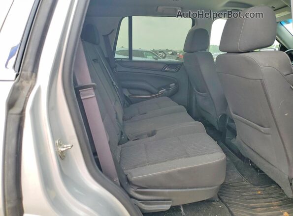 1GNSCAECXGR475645 2016 CHEVROLET TAHOE Серебряный Вид задней части салона