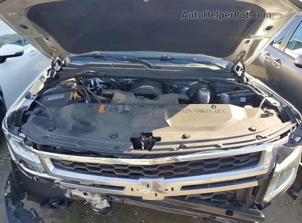 1GNSCBKC1JR139013 2018 CHEVROLET TAHOE Серебряный Вид задней части салона
