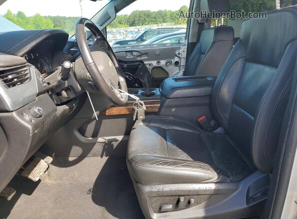 1GNSCBKC3LR120255 2020 CHEVROLET TAHOE Серебряный Вид салона спереди